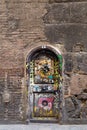 Graffiti on old door in BarcelonaÃ¢â¬â¢s Gothic Quarter